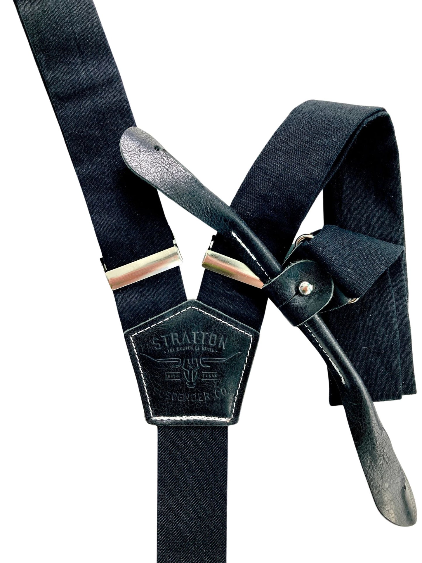 Black linen button-on suspenders with black leather tabs and back patch, handmade in Texas for modern wedding style, formalwear, and classic menswear collections.