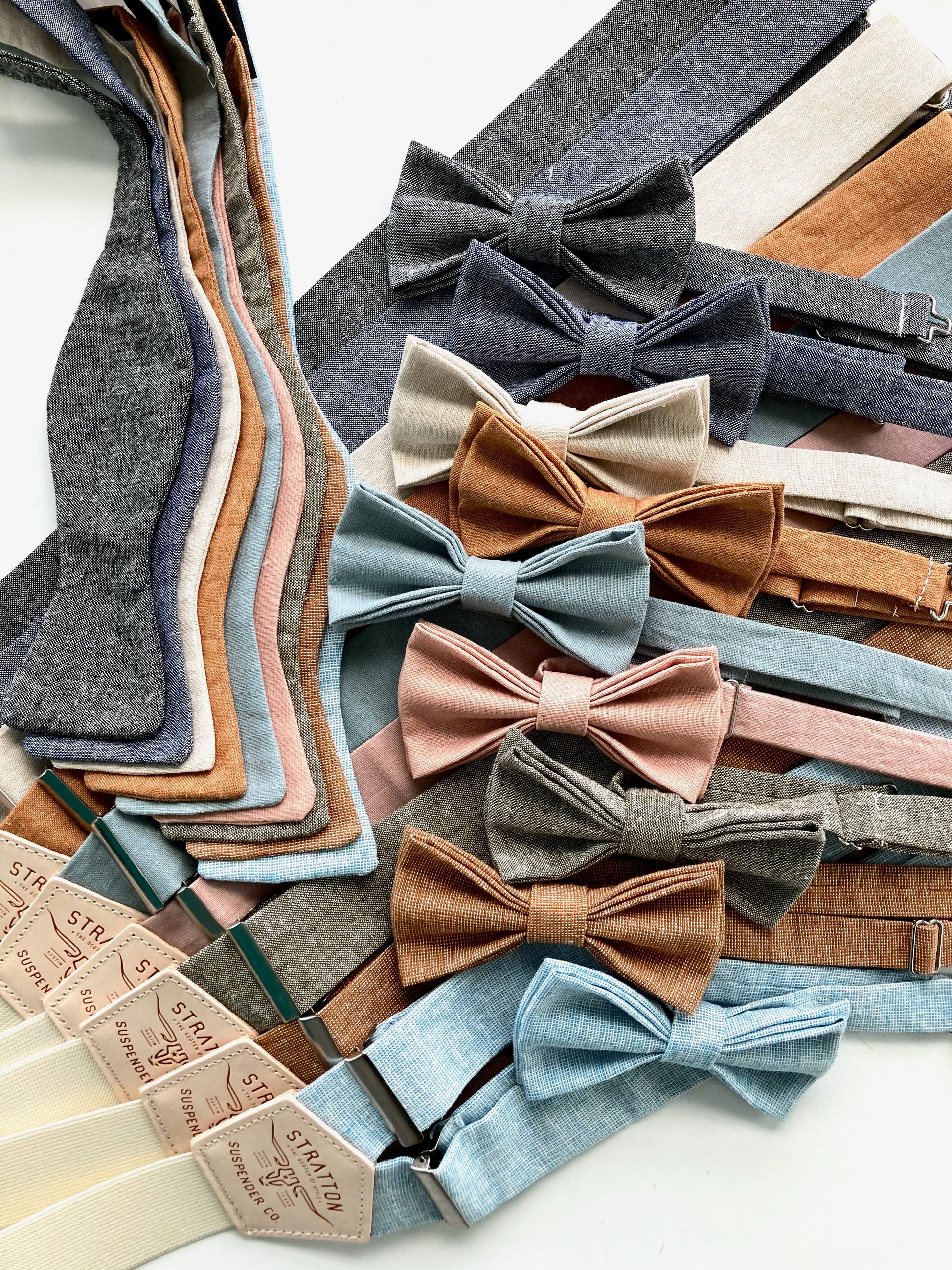 Coordinated suspenders and bow ties in various wedding colors, with self-tie and pre-tied styles perfect for groomsmen or rustic bridal parties.