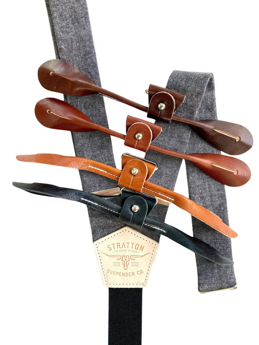 Charcoal linen button-on suspenders with tan and black leather loop options, handmade in Texas by Stratton Suspender Co.—a refined menswear accessory for weddings, formal events, and groomsmen attire.