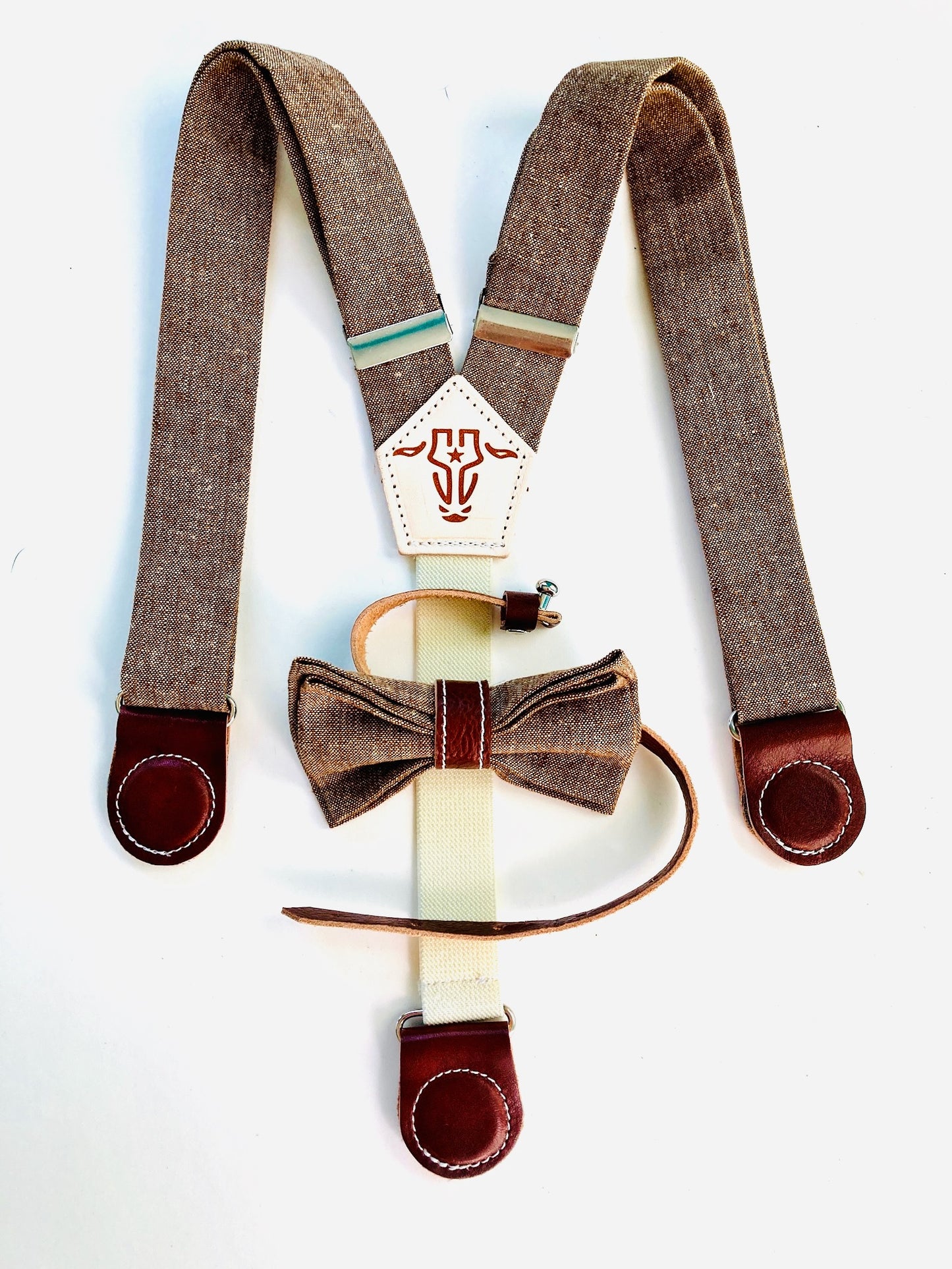 Handmade brown linen suspenders for children, finished with brown leather magnetic clasps and a matching bow tie—perfect for weddings or special occasions.