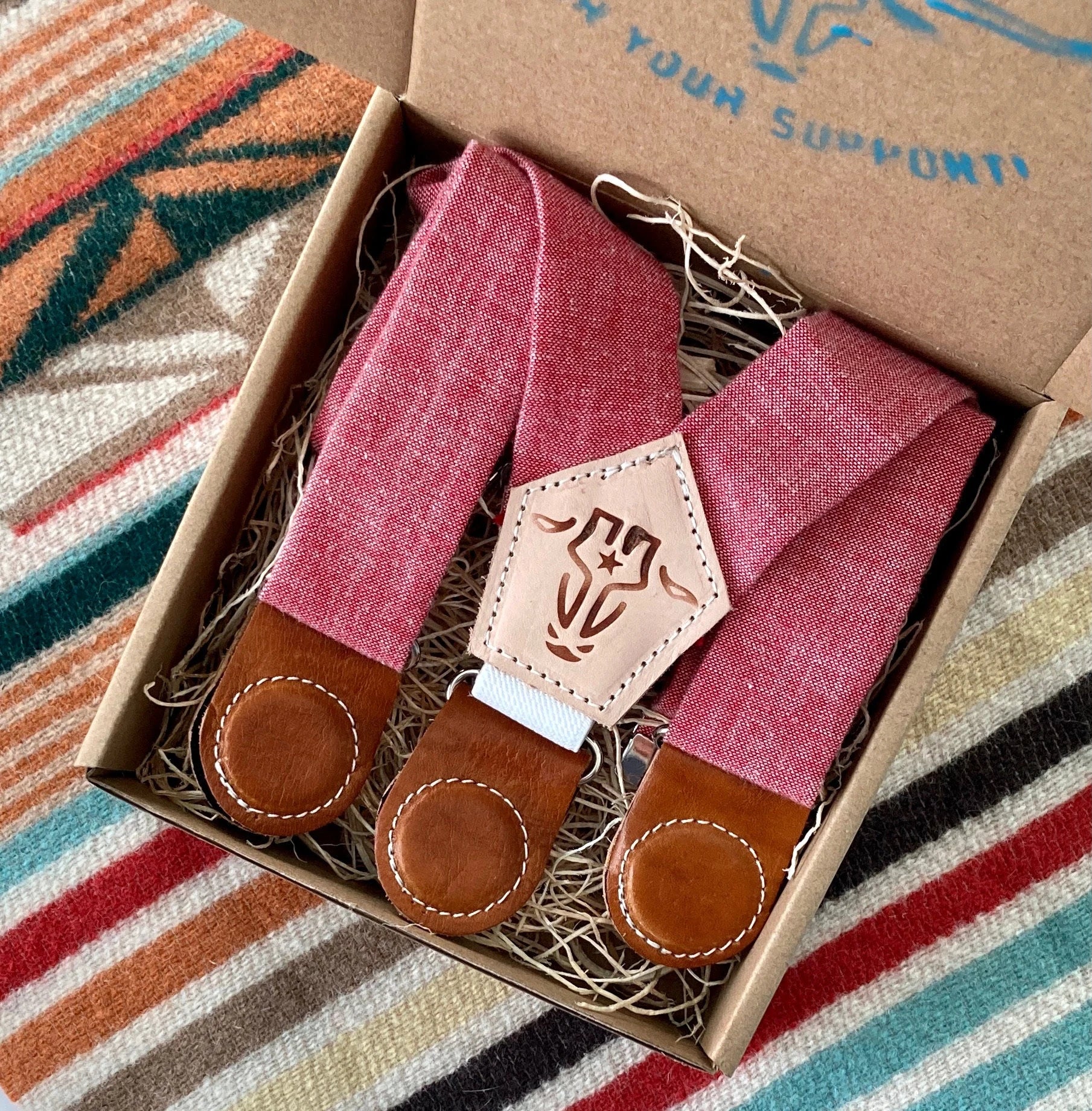 Children’s red linen suspenders with leather magnetic clasps, packaged in a kraft gift box—perfect for weddings, church, or formal kidswear.