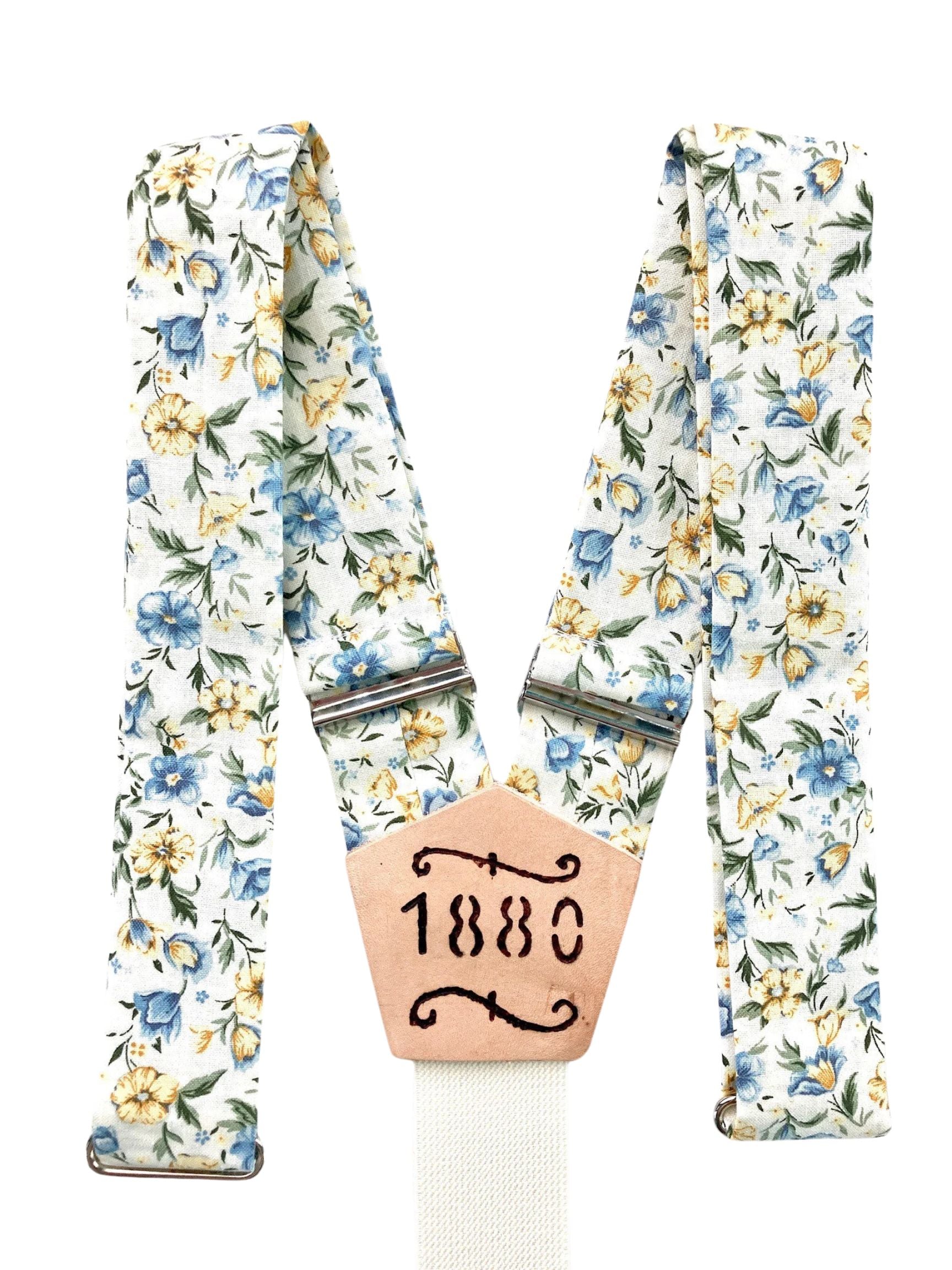 Cornflower blue and marigold floral wedding suspenders with custom '1880' leather patch, handmade by Stratton Suspender Co.