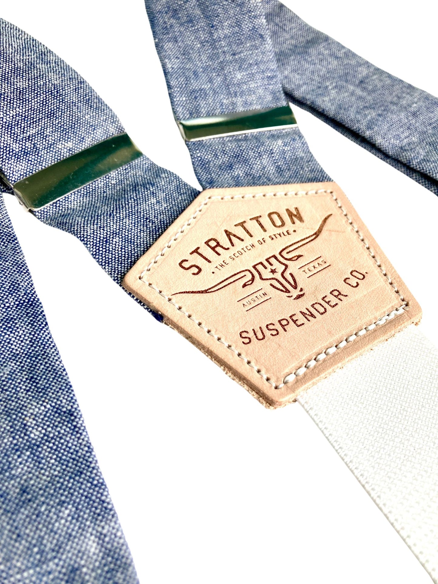 Denim blue linen suspenders with leather button ends, handmade wedding braces for grooms, groomsmen, or rustic formalwear suits.