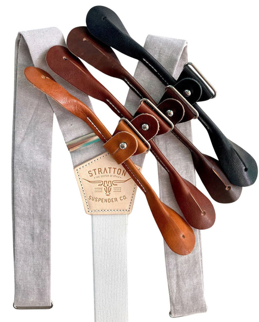 Dove gray linen button-on suspenders with premium leather tabs in four colors, handmade in Texas by Stratton Suspender Co. — formal braces for weddings, suits, and heritage menswear.
