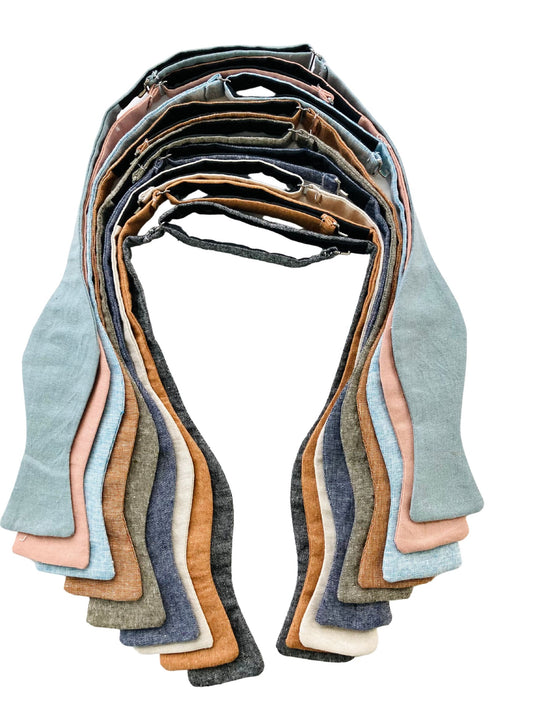 Handmade linen self-tie bow ties in assorted wedding colors, perfect for groomsmen and rustic formalwear — by Stratton Suspender Co.