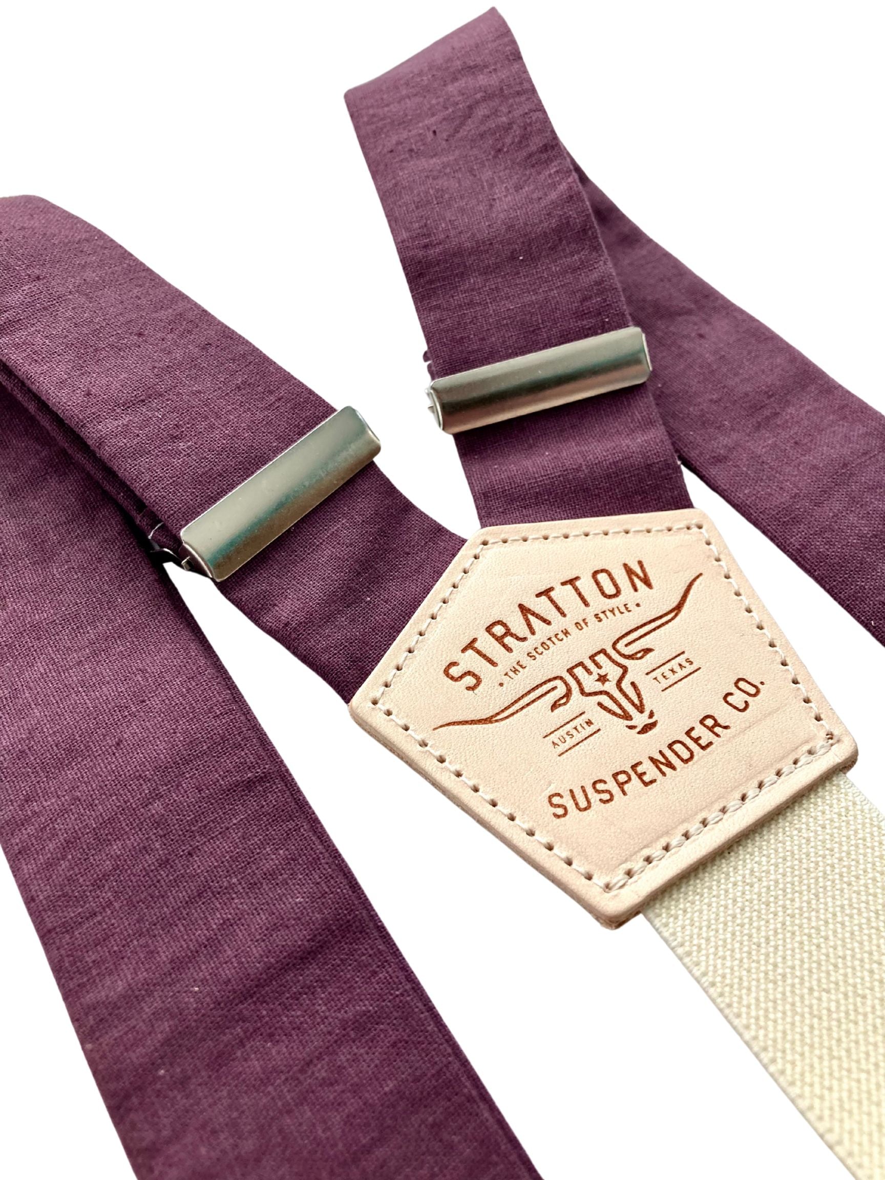 Detail view of handmade plum button-on suspenders in linen with cream elastic Y-back and metal adjusters, ideal for rustic groomsmen outfits.