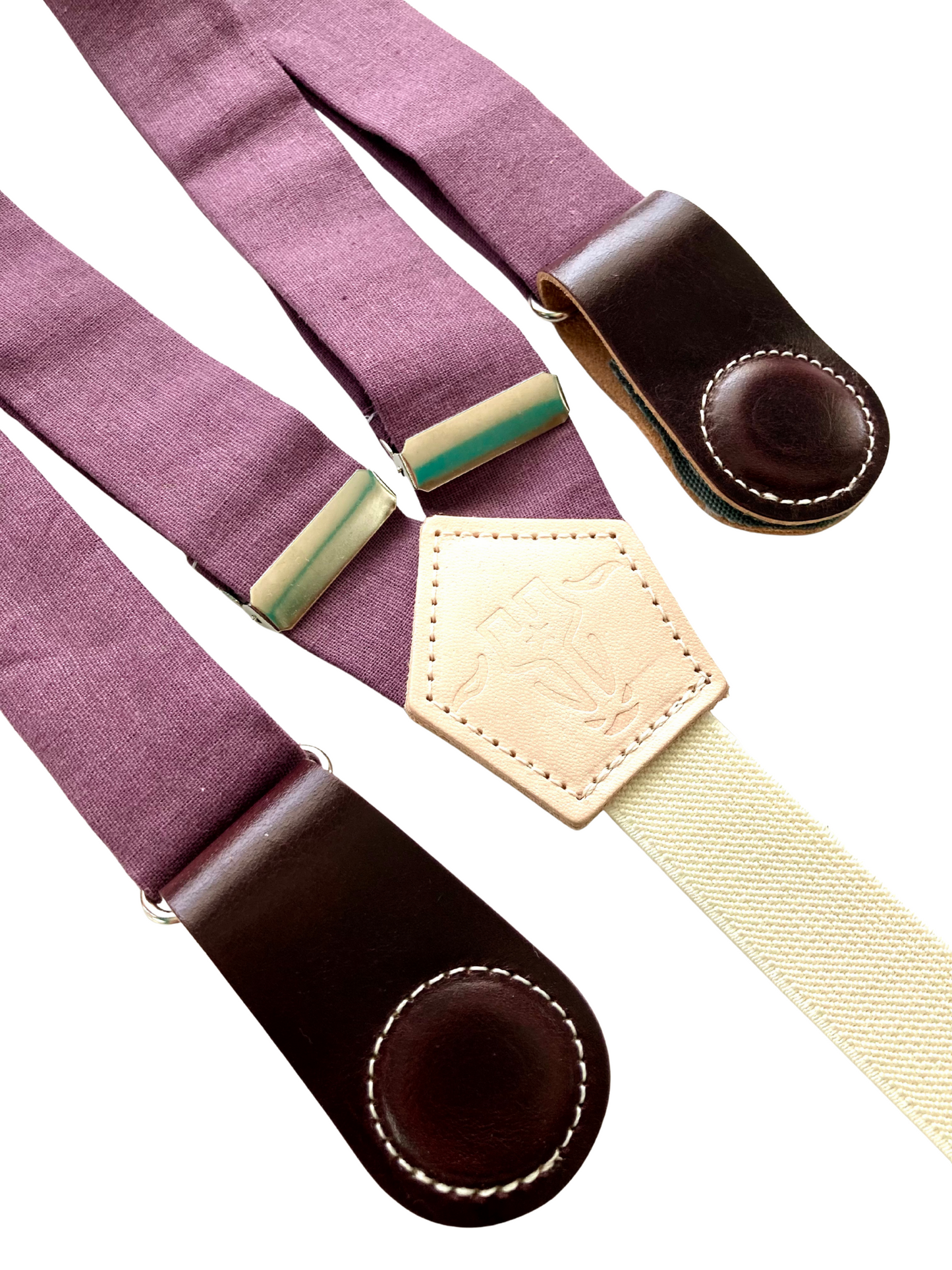 Plum women’s linen suspenders with wine leather magnetic clasps, handmade in Texas for fall and year-round capsule outfits.