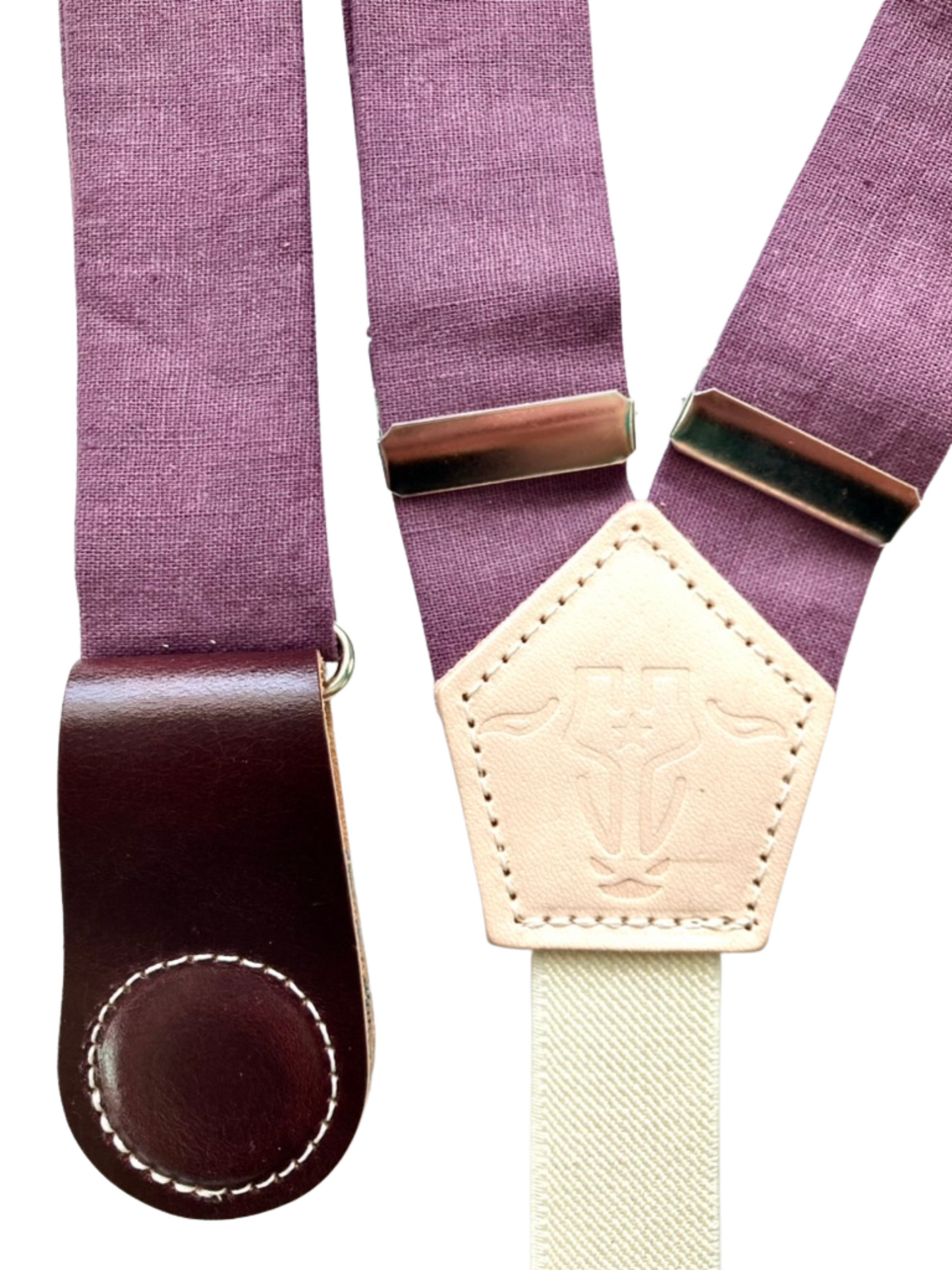 Back detail of plum linen women’s suspenders with wine leather magnetic clasps and premium stitching.
