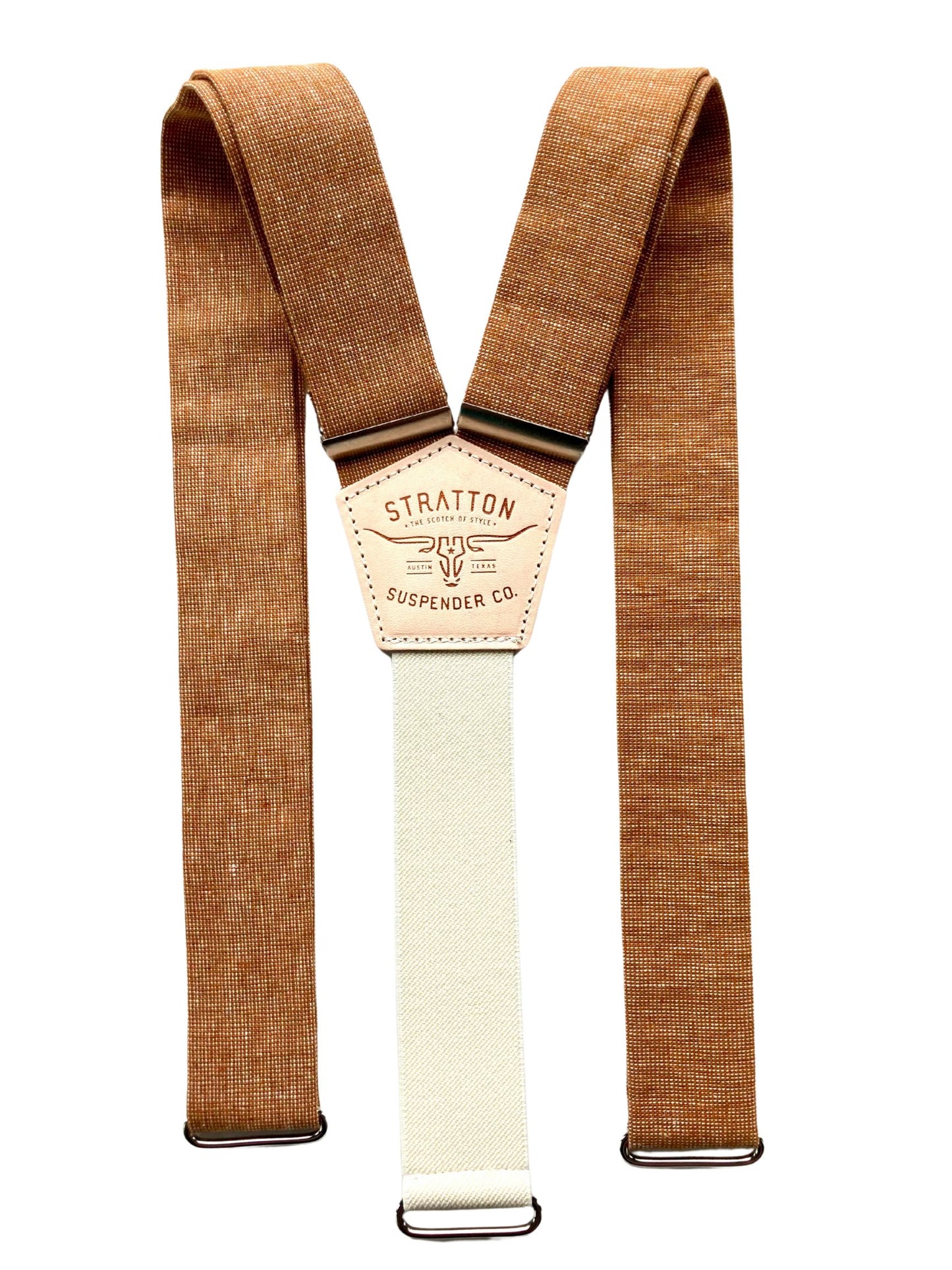 Flat lay of roasted pecan brown hand-woven linen suspenders with cream elastic back strap and Stratton Suspender Co. patch, designed for rustic wedding menswear, groomsmen gifts, or groom accessories.