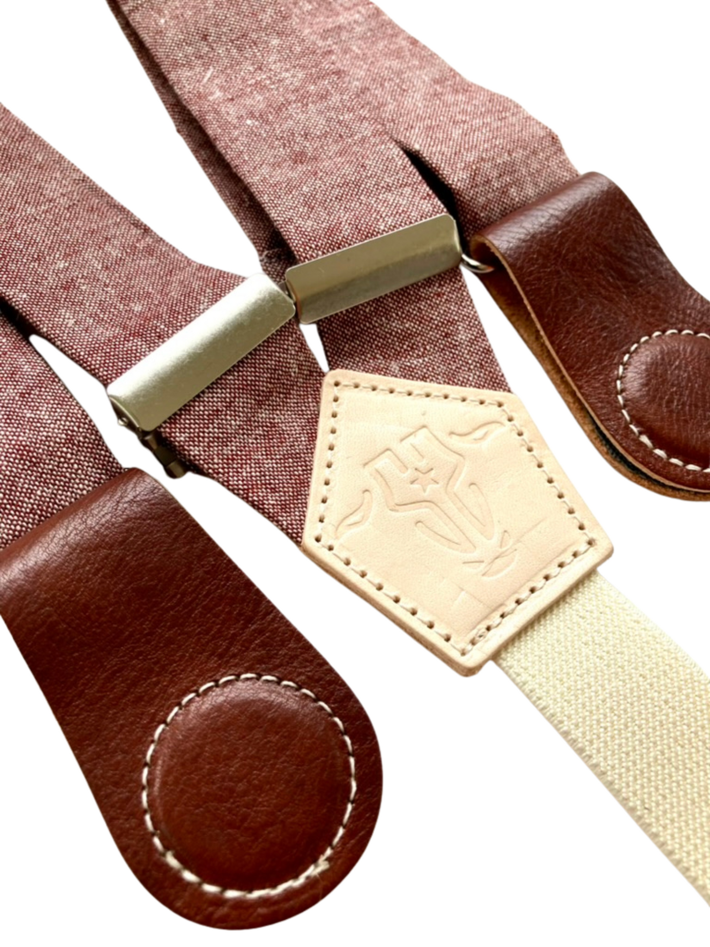 Rust maroon women’s linen suspenders with cognac leather magnetic clasps, handcrafted in Texas for fall and year-round outfits.