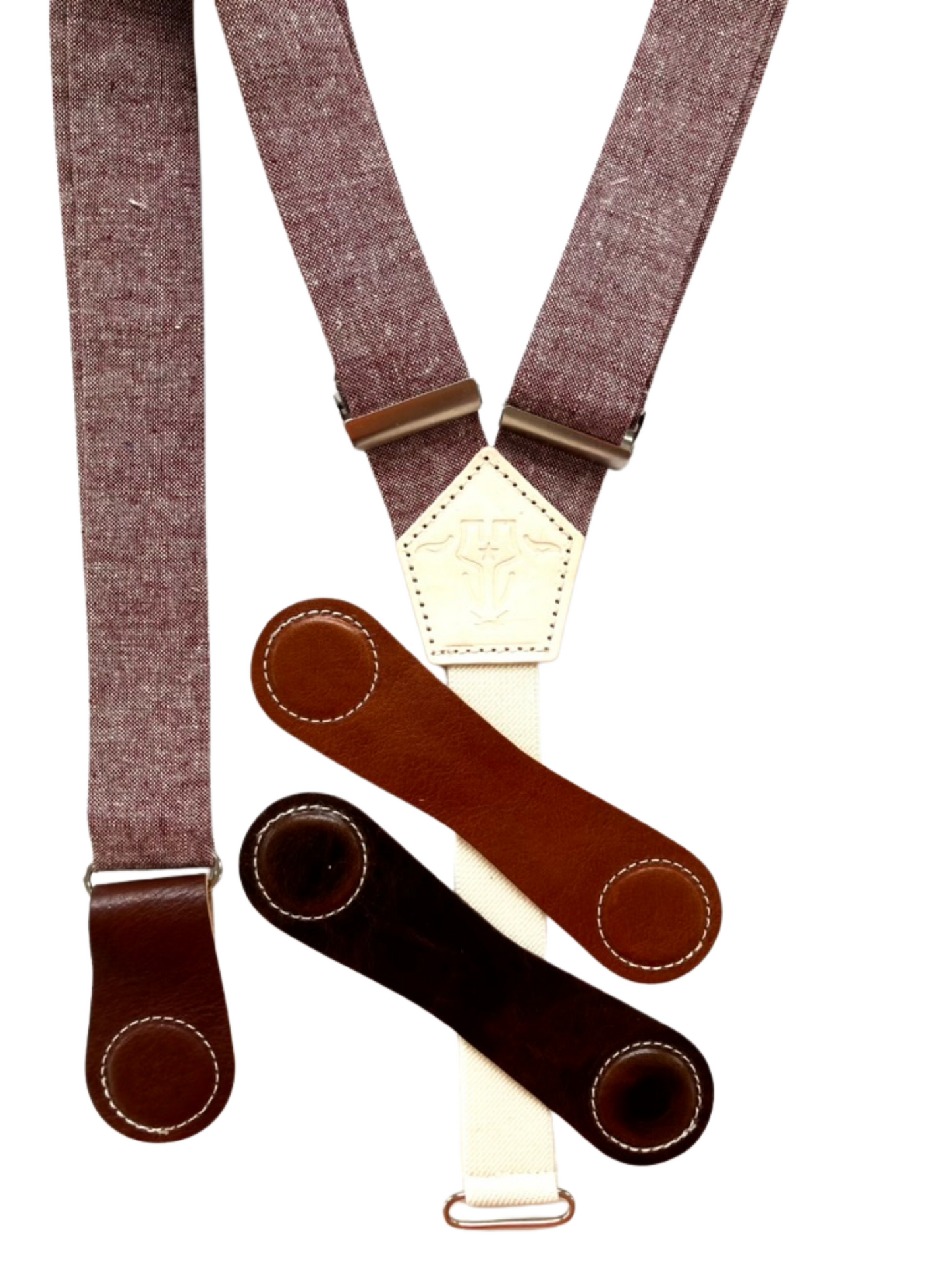 Rust maroon women’s linen suspenders with interchangeable leather magnetic clasps in cognac, tan, and chocolate.