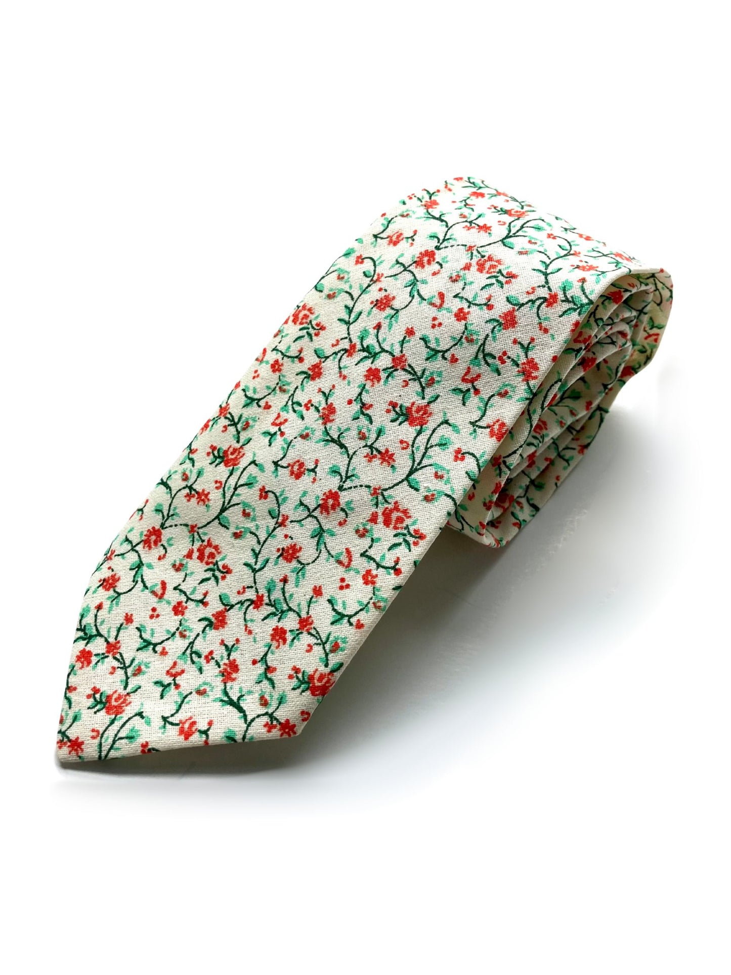 Rustic orange and green floral wedding necktie in vintage calico fabric, handmade for groomsmen and groom attire, perfect for spring and fall weddings by Stratton Suspender Co.