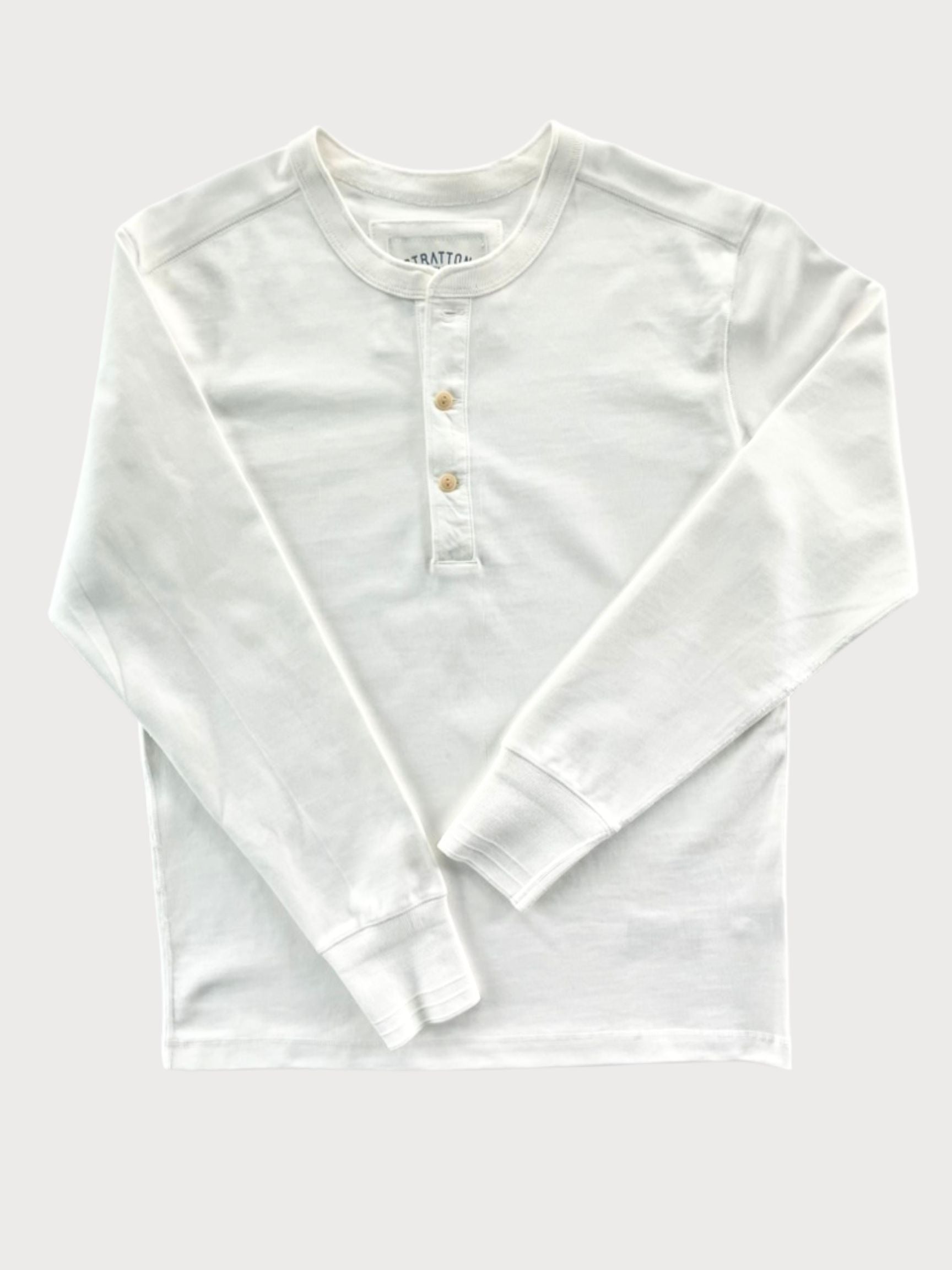 Vintage 1940s White Heavyweight Henley by Stratton Suspender Co. Features a three-button placket, ribbed cuffs, and premium heavyweight cotton. Made in the USA for durability, comfort, and classic heritage workwear style.
