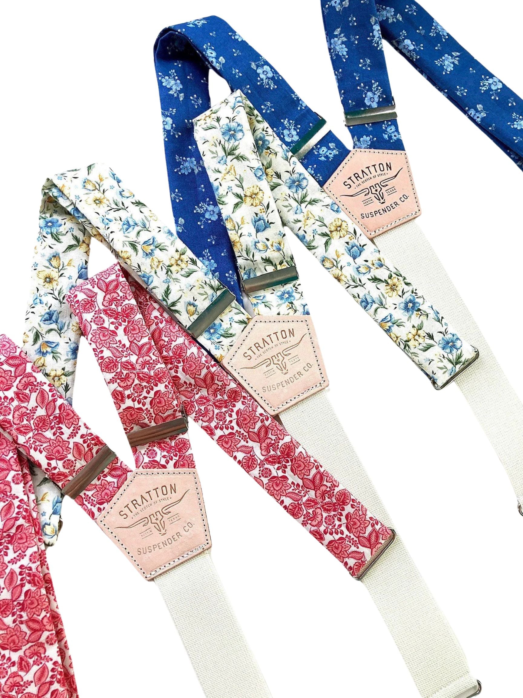 Vintage floral suspenders collection with blue, marigold, and red floral patterns, handmade button-on wedding suspenders by Stratton Suspender Co.
