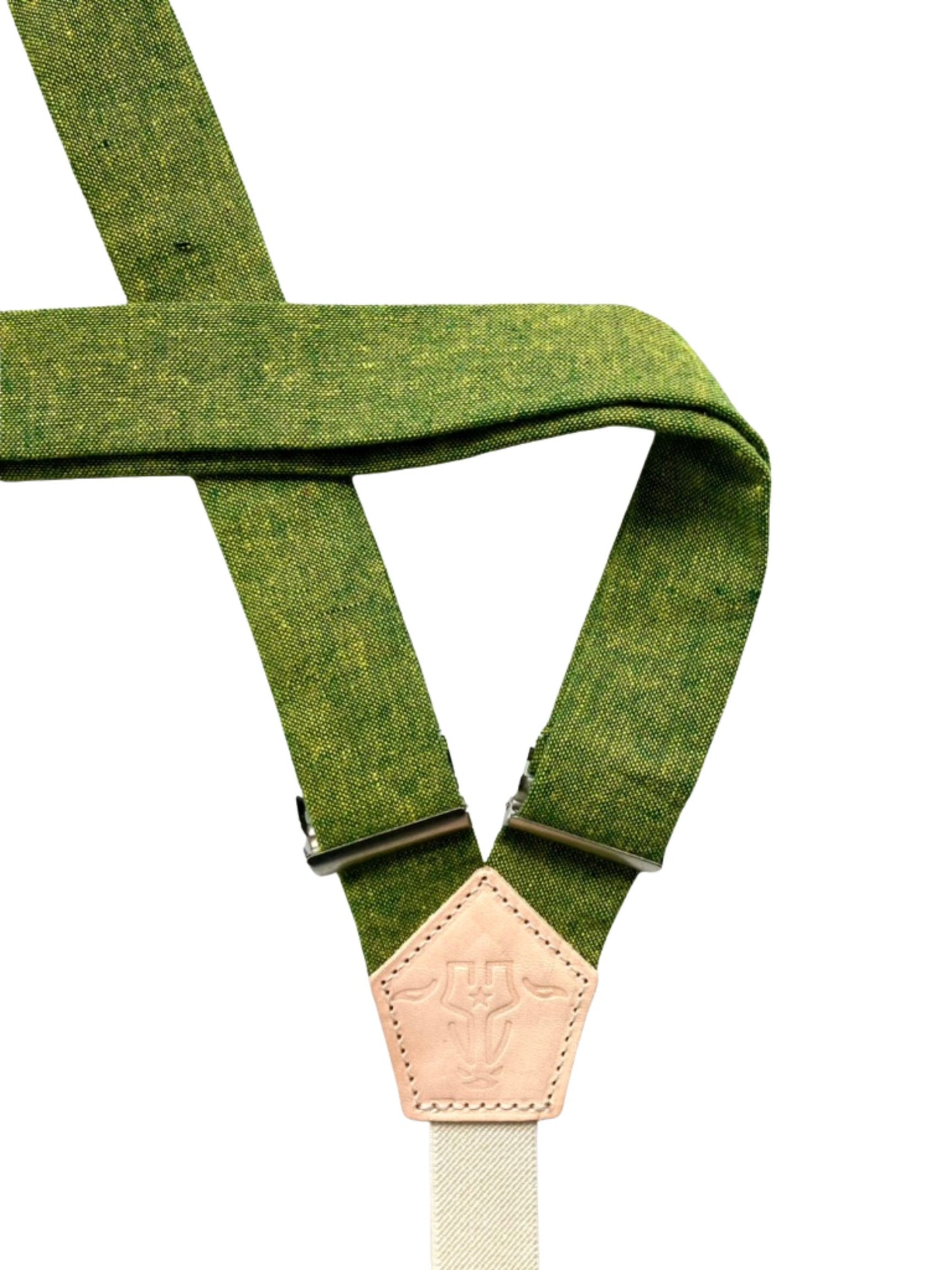 Back view of chartreuse green linen women’s suspenders with natural leather logo patch and cream elastic strap.