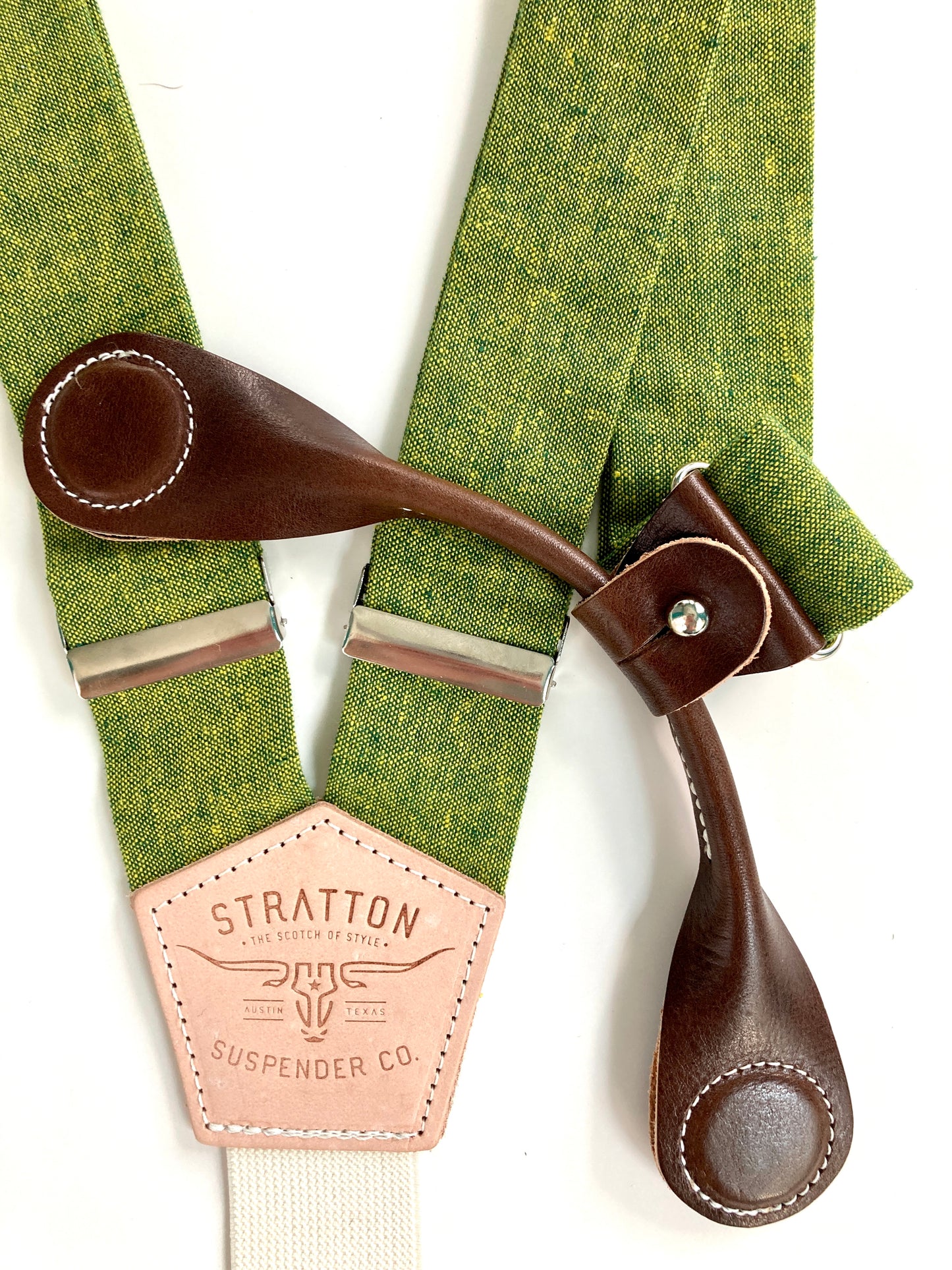 Stratton Suspender Co. features the Palm green with yellow woven threaded linen suspenders on veg tan shoulder leather with cream colored elastic back strap for the Fall 2022 suspenders collection Magnetic Stratton Suspender clasps in Chocolate Pontedero Italian leather hand-picked by Stratton Suspender Co.