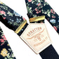 Close-Up of Black Floral Wedding Suspenders with Gold Hardware and Leather Details – Vintage Linen Straps for Grooms & Groomsmen. Perfect for Rustic, Boho, and Vintage Wedding Themes. Handmade by Stratton Suspender Co.