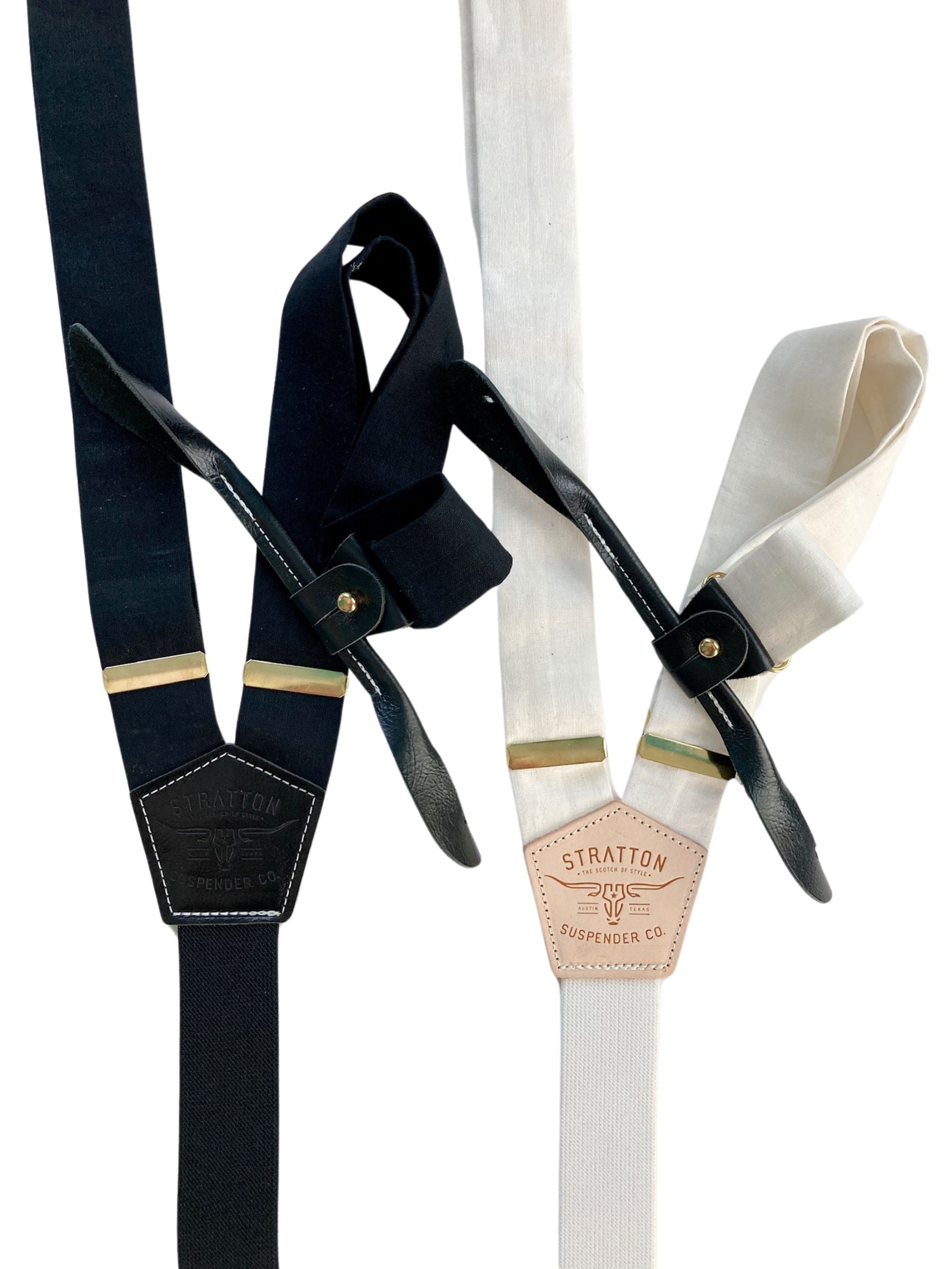 Handmade black tie and ivory linen button-on suspenders featuring full-grain veg-tan leather, gold-colored solid brass hardware, and premium soft twill elastic. Ethically made in Texas, perfect for weddings, groomsmen, formal wear, and classic heritage menswear.
