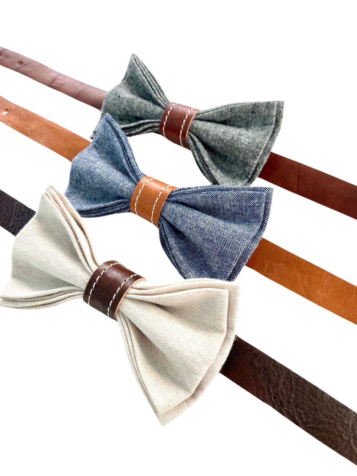 Black linen bowtie with cognac leather knot

Blue linen bowtie with tan leather knot 

Beige linen bowtie with chocolate knot