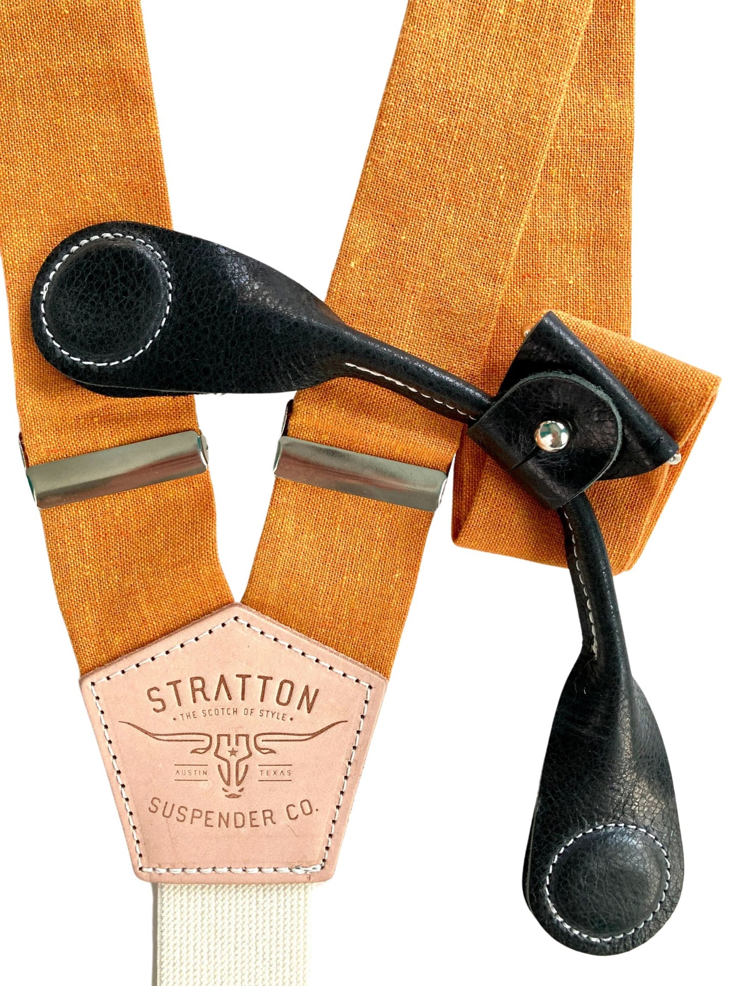 Stratton Suspender Co. features the orange linen suspenders on veg tan shoulder leather with cream colored elastic back strap for the Fall suspenders collection clasps in black Pontedero Italian leather hand-picked by Stratton Suspender Co.