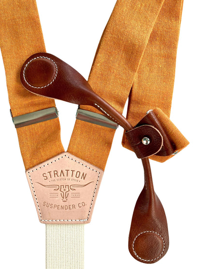 Stratton Suspender Co. features the orange linen suspenders on veg tan shoulder leather with cream colored elastic back strap for the Fall suspenders collection clasps in cognac Pontedero Italian leather hand-picked by Stratton Suspender Co.
