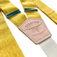 Stratton Suspender Co. features the Yellow linen suspenders on veg tan shoulder leather with cream colored elastic back strap for the Fall 2022 suspenders collection 