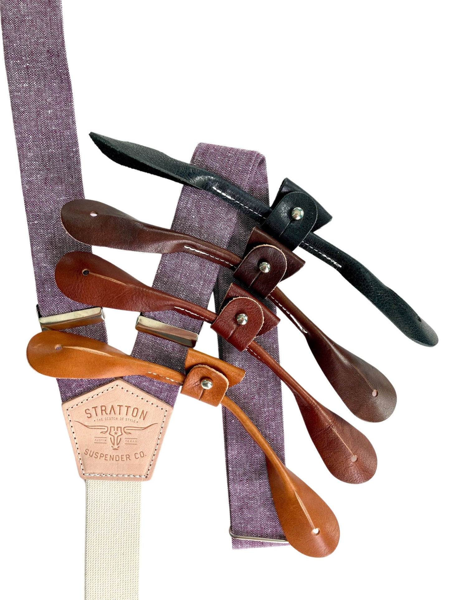 Purple Linen Stratton Suspender Co. Set with one button on attachment in the following colors from top to bottom: Black, Chocolate (dark brown), Cognac (reddish brown), Tan (light brown)