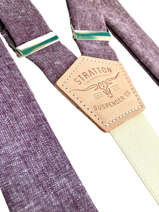 Stratton Suspender Co. features the purple linen suspenders on veg tan shoulder leather with cream colored elastic back strap for the Fall 2022 suspenders collection