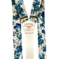 Heritage blue floral linen suspenders with a cream twill elastic back strap and brass hardware. Handmade button-on suspenders for weddings, groomsmen, and vintage menswear. Ethically crafted with premium materials for a timeless, elegant look.