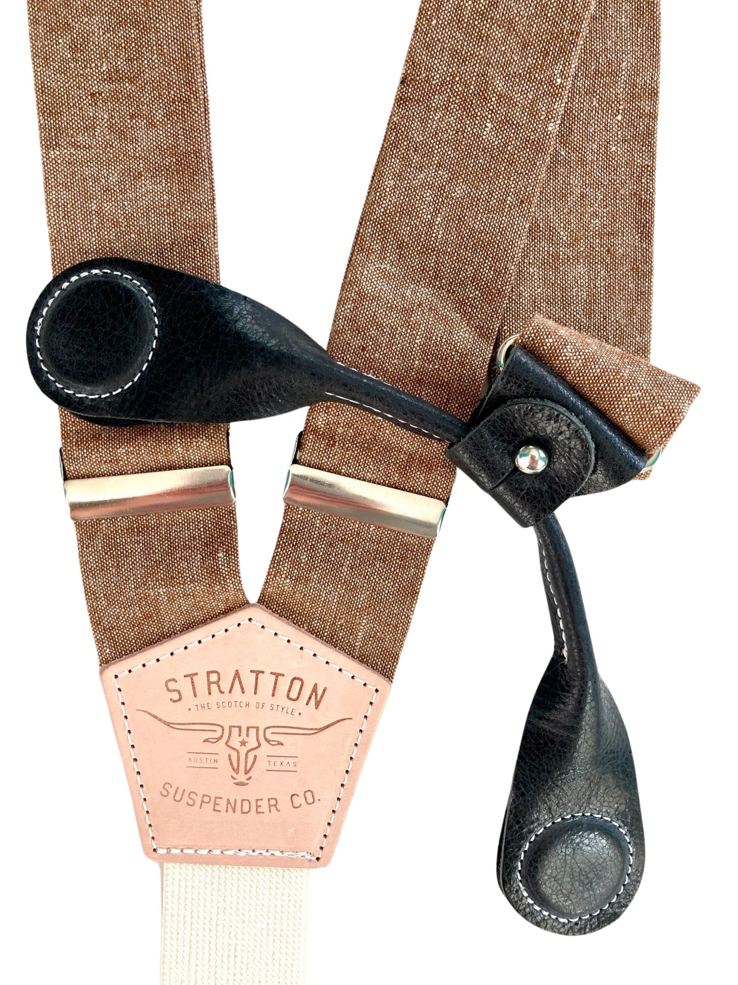 Stratton Suspender Co. features the Nutmeg (brown) linen suspenders on veg tan shoulder leather with cream colored elastic back strap for the Fall 2022 suspenders collection Magnetic Stratton Suspender clasps in Black Pontedero Italian leather hand-picked by Stratton Suspender Co.