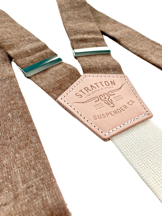 Stratton Suspender Co. features the Brown linen suspenders on veg tan shoulder leather with cream colored elastic back strap for the Fall 2022 suspenders collection