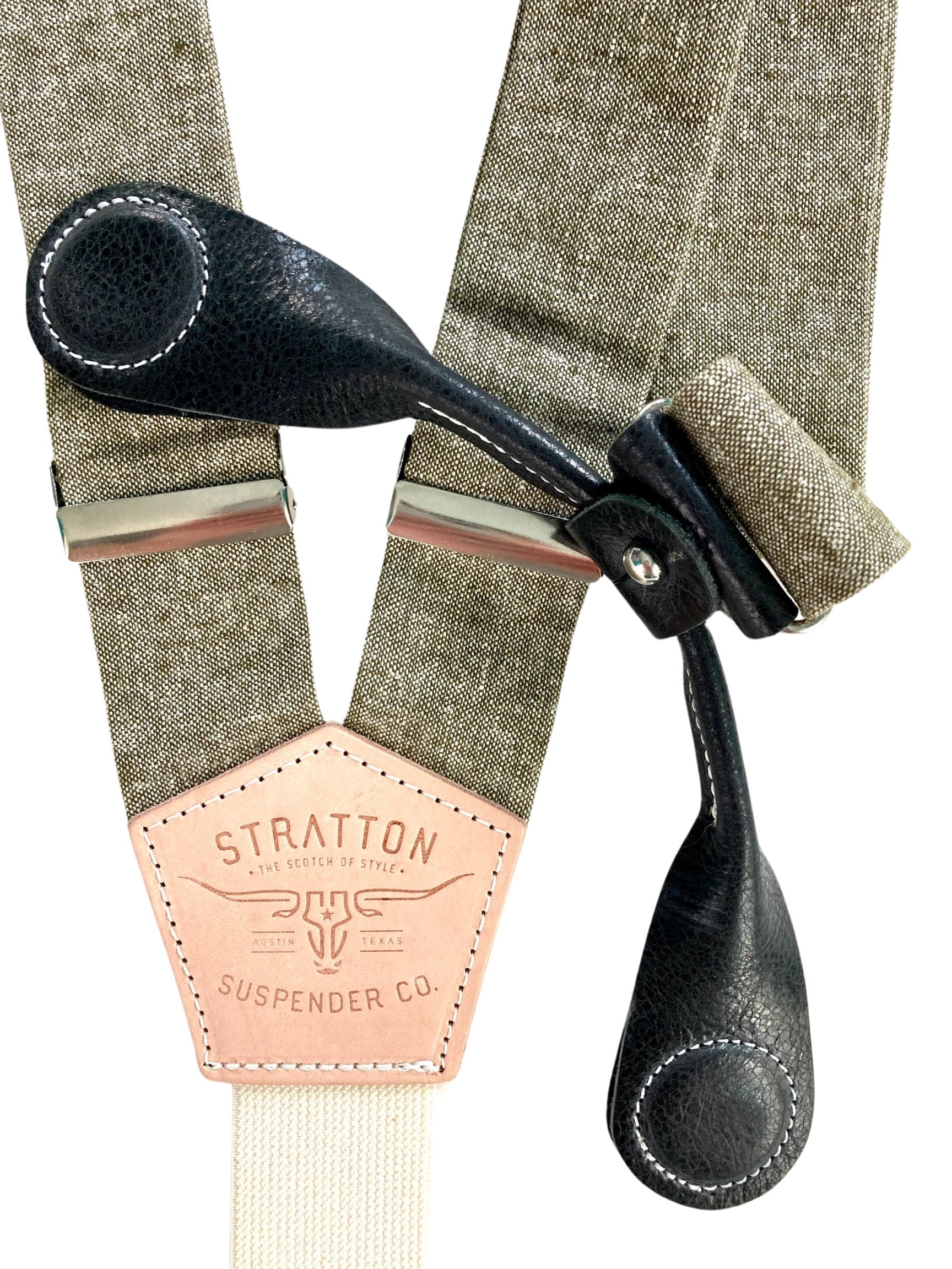 Stratton Suspender Co. features the Olive Green linen suspenders on veg tan shoulder leather with cream colored elastic back strap for the Fall 2022 suspenders clasps in Black Pontedero Italian leather hand-picked by Stratton Suspender Co.