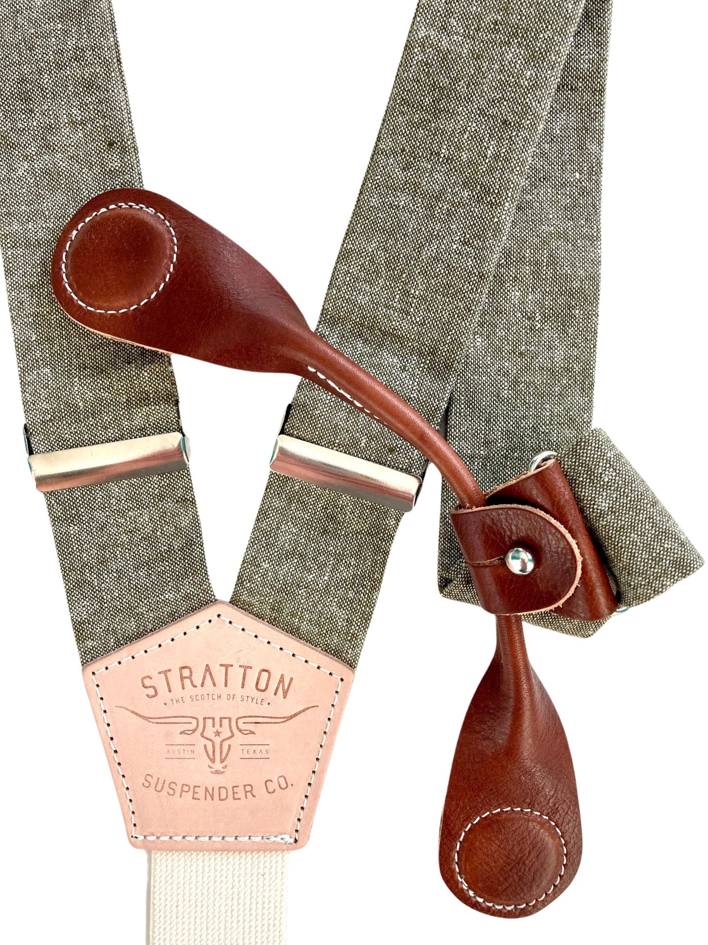 Stratton Suspender Co. features the Olive Green linen suspenders on veg tan shoulder leather with cream colored elastic back strap for the Fall 2022 suspenders clasps in Cognac Pontedero Italian leather hand-picked by Stratton Suspender Co.