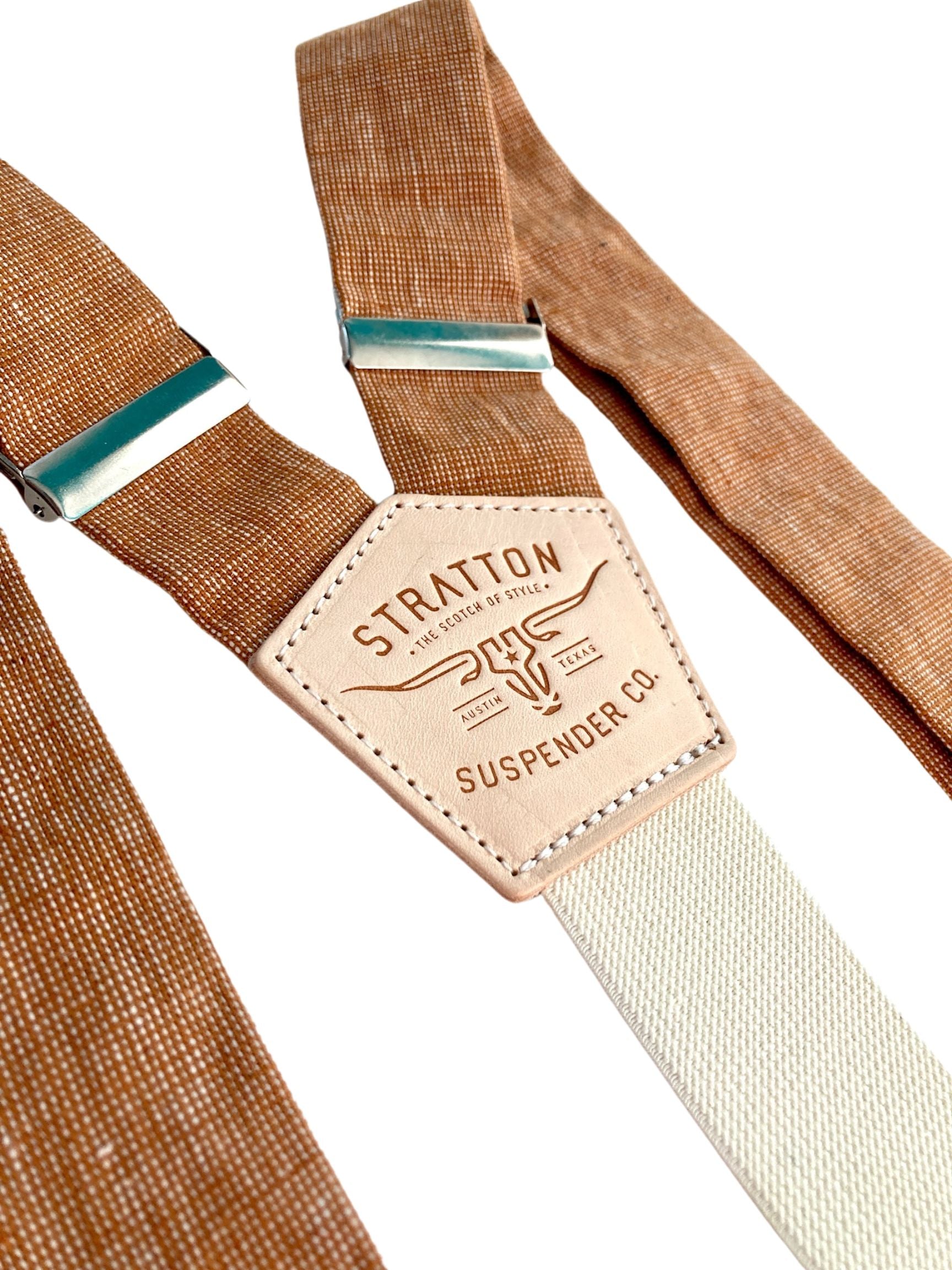 Stratton Suspender Co. features the Roasted pecan Burnt Orange linen suspenders on veg tan shoulder leather with cream colored elastic back strap for the Fall 2022 suspenders collection