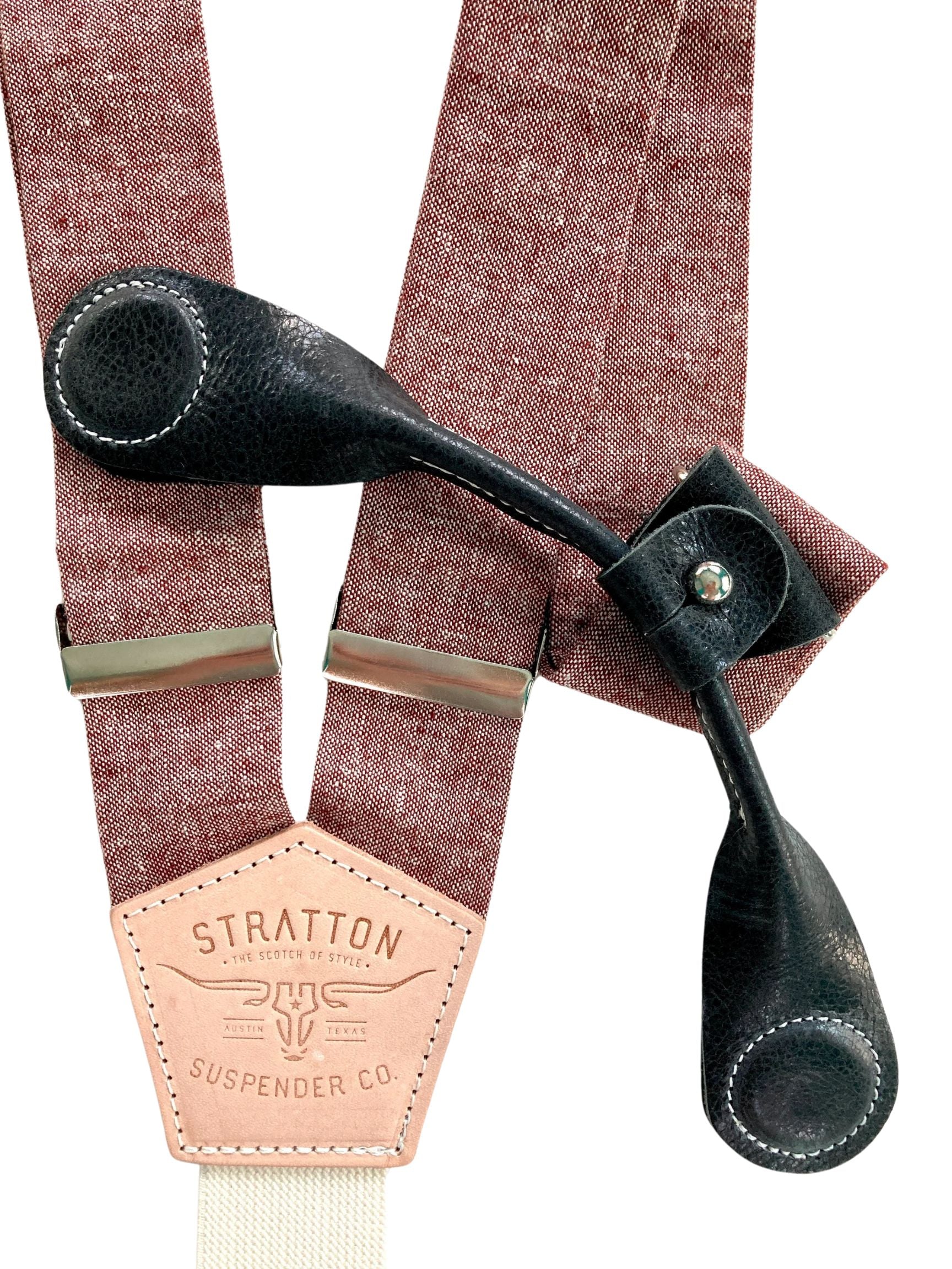 Stratton Suspender Co. features the Rust (Maroon) linen suspenders on veg tan shoulder leather with cream colored elastic back strap for the Fall 2022 suspenders clasps in Black Pontedero Italian leather hand-picked by Stratton Suspender Co.