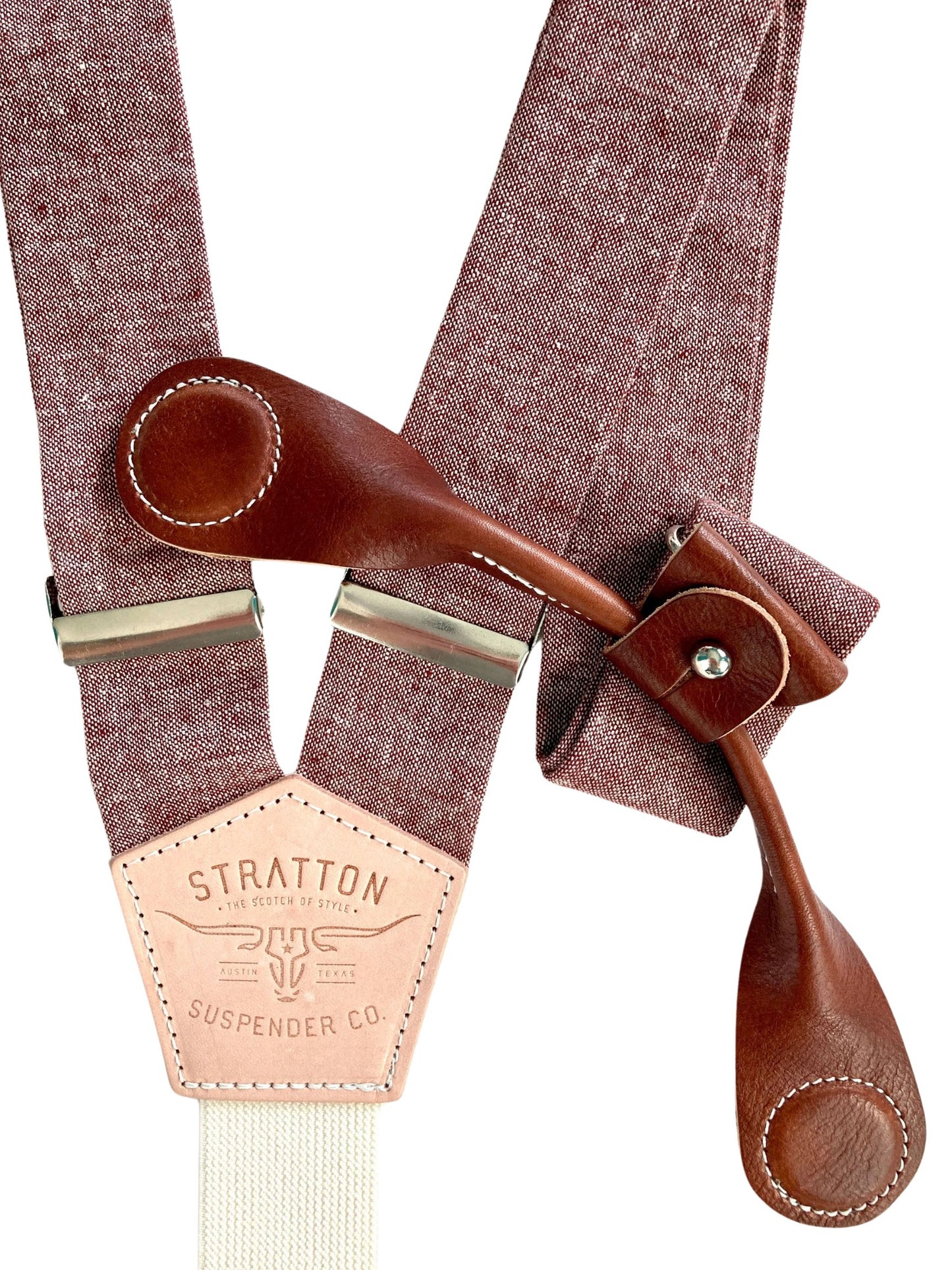 Stratton Suspender Co. features the Rust (Maroon) linen suspenders on veg tan shoulder leather with cream colored elastic back strap for the Fall 2022 suspenders clasps in Cognac Pontedero Italian leather hand-picked by Stratton Suspender Co.