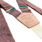 Stratton Suspender Co. features the maroon linen suspenders on veg tan shoulder leather with cream colored elastic back strap for the Fall 2022 suspenders collection