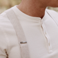 Close-Up of Ivory Beige Button-On Suspenders by Stratton Suspender Co. – Paired with Vintage-Inspired Henley Shirt – Heritage American Menswear – Handmade in USA