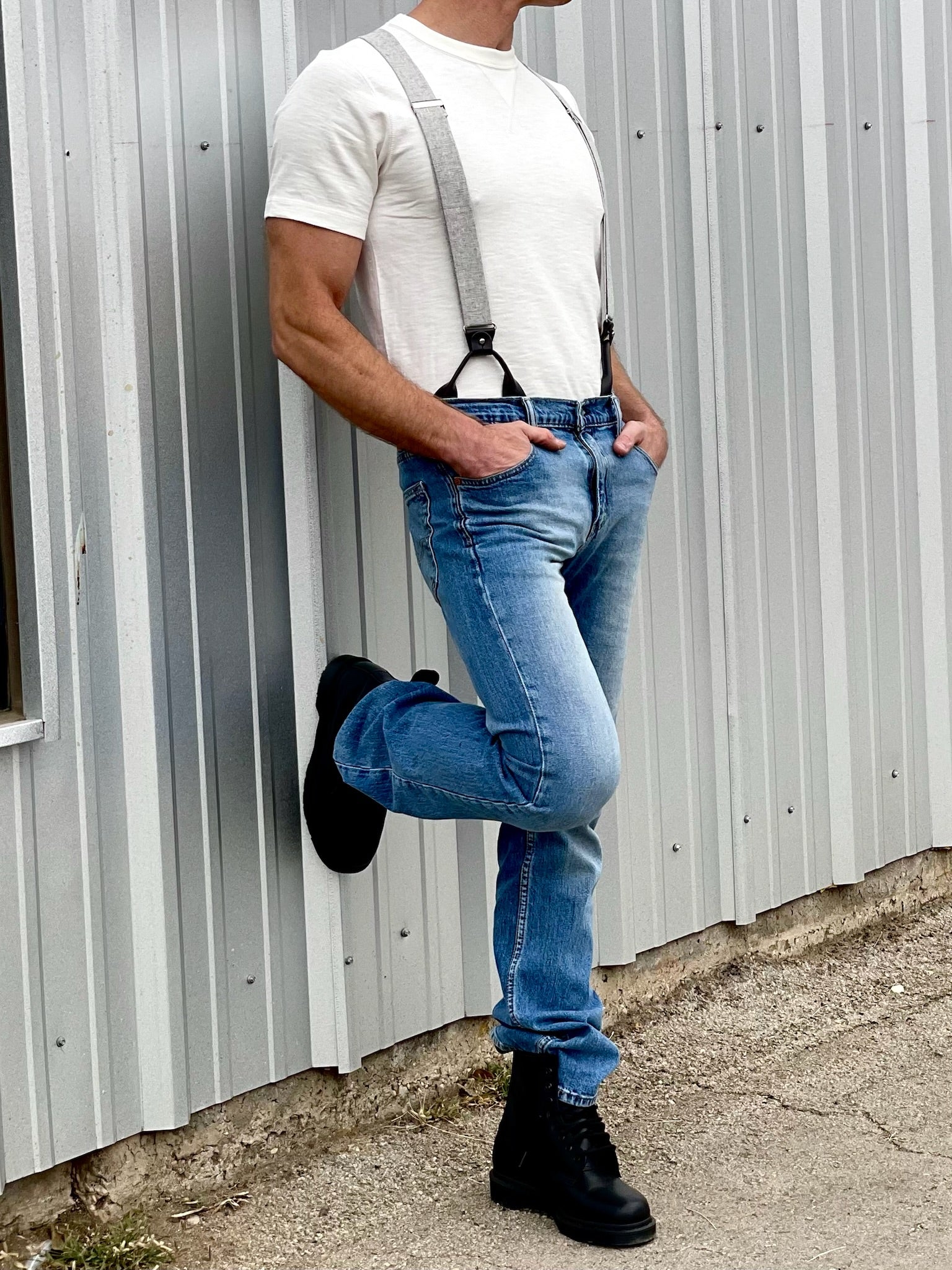 Vintage Charcoal Button-On Suspenders with black leather attachments, styled with jeans and a white t-shirt for classic heritage American menswear. Handmade in the USA, these premium suspenders are perfect for rustic weddings, groomsmen gifts, and timeless style.