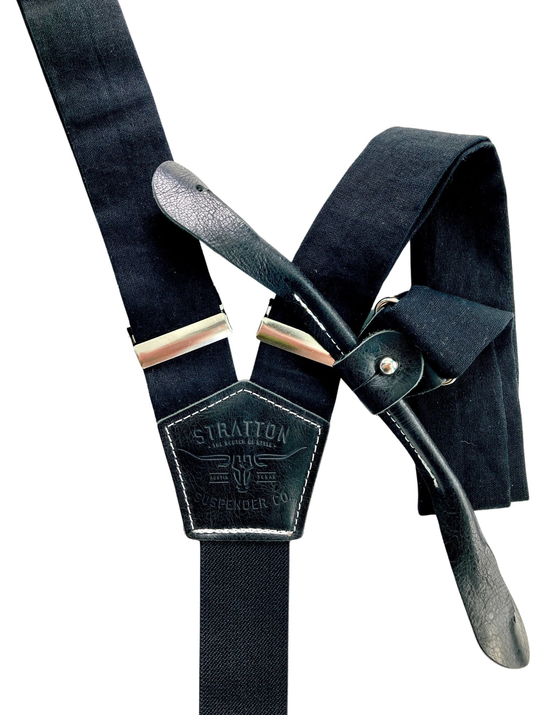 Black linen button-on suspenders with black leather tabs and back patch, handmade in Texas for modern wedding style, formalwear, and classic menswear collections.