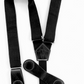 Black women’s suspenders with magnetic leather clasp partially open to show closure design – handmade in Texas
