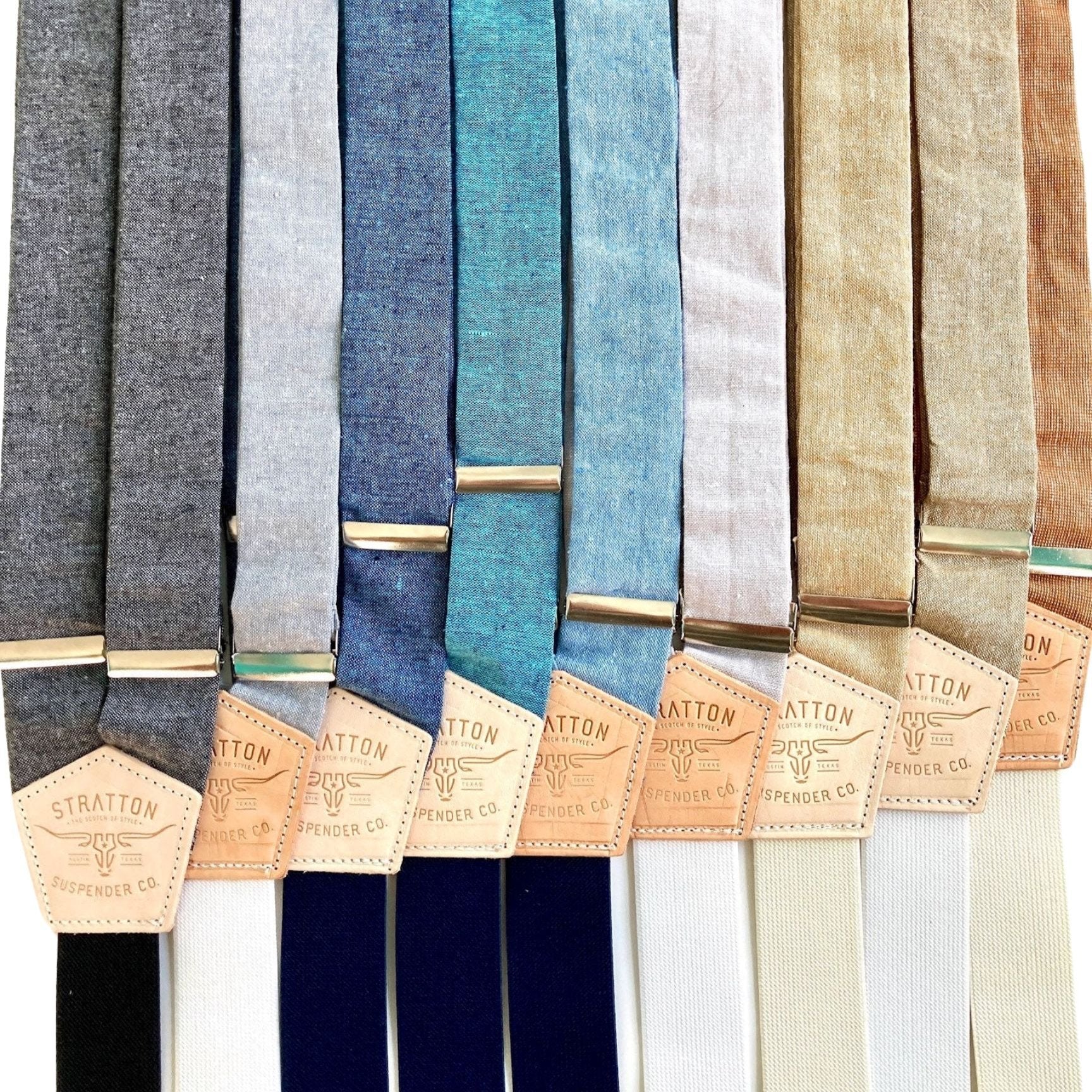 A collection of handcrafted linen wedding suspenders in Charcoal Black, Steel Gray, Peacock, Turquoise, Pastel Blue, Heather Gray, Tan, Taupe, and Burnt Orange. Designed for grooms and groomsmen, these button-on suspenders feature premium woven fabric, genuine leather accents, and polished hardware. Perfect for rustic, vintage, and classic wedding themes, and handmade with care in the USA.