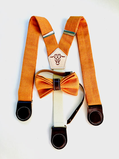 Orange linen kids' suspenders with full-grain leather magnetic clasps and a coordinating leather-accented bow tie—perfect for weddings or formal events.