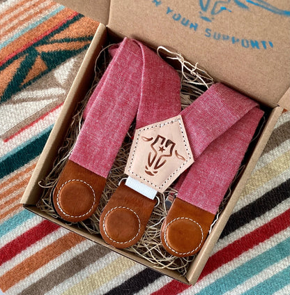 Children’s red linen suspenders with leather magnetic clasps, packaged in a kraft gift box—perfect for weddings, church, or formal kidswear.