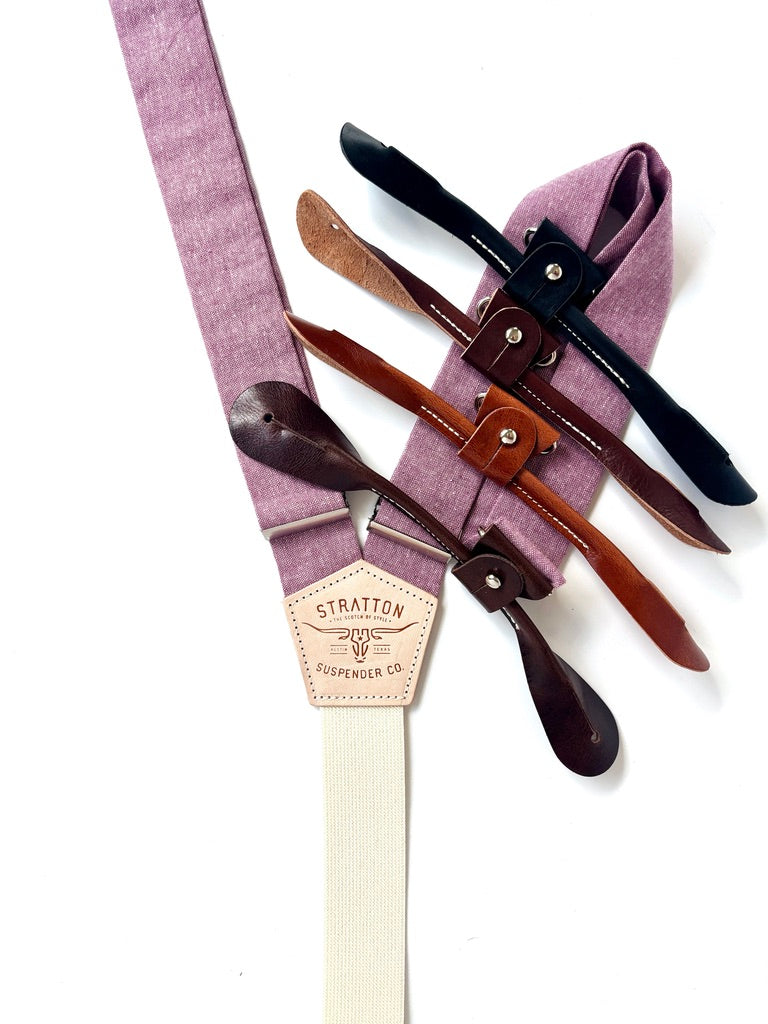 Set of suspenders with different color options on a white background