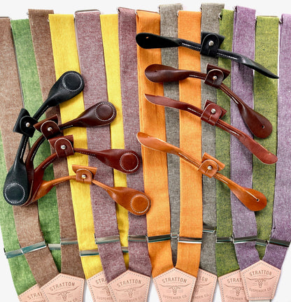 Fall linen suspenders in earthy tones with tan, cognac, chocolate, and black leather button-on tabs by Stratton Suspender Co.; handcrafted in Texas for rustic weddings and groomsmen formalwear.