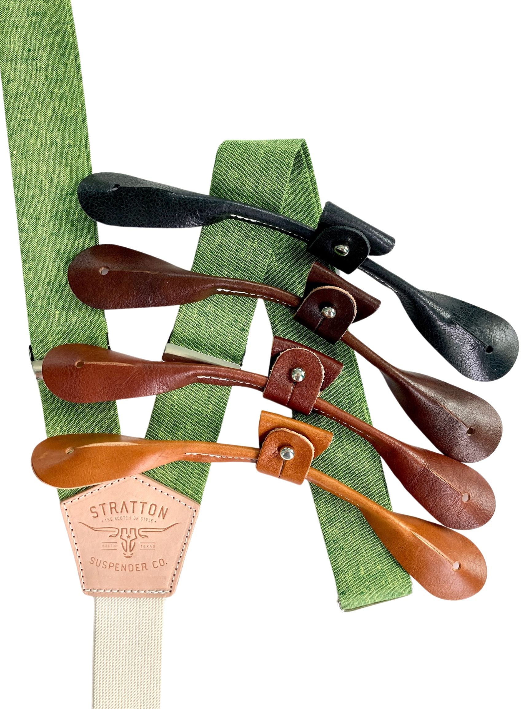 Forest Green Button-On Suspenders by Stratton Suspender Co. Featuring premium linen straps with full-grain leather button-on attachments in black, chocolate brown, dark brown, and tan. Designed for weddings, groomsmen, and vintage menswear styling. Handmade in the USA for exceptional quality and comfort.