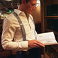 Formal blue suspenders with tan magnetic clasps styled with dress shirt and slacks at the Driskill Hotel in downtown Austin.