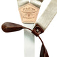 Ivory Beige Button-On Suspenders with Chocolate Brown Leather attachments, handmade for weddings, groomsmen, and formalwear. Vintage-inspired linen suspenders with classic button-on braces for a timeless Rustic American style. Ethically crafted in Texas, USA.