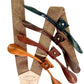 Nutmeg brown linen suspenders with button-on leather attachments in tan, cognac, chocolate, and black, handmade in Texas for rustic weddings, groomsmen, and vintage formalwear.